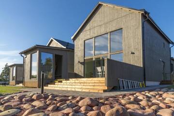Фото номера Вилла с 3 спальнями - С видом на пляж Виллы Strandby Villas Käringsund г. Экерё 6