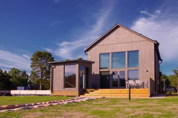 Фото номера Вилла с 3 спальнями - С видом на пляж Виллы Strandby Villas Käringsund г. Экерё 15