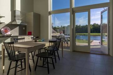 Фото номера Вилла с 3 спальнями - С видом на пляж Виллы Strandby Villas Käringsund г. Экерё 24